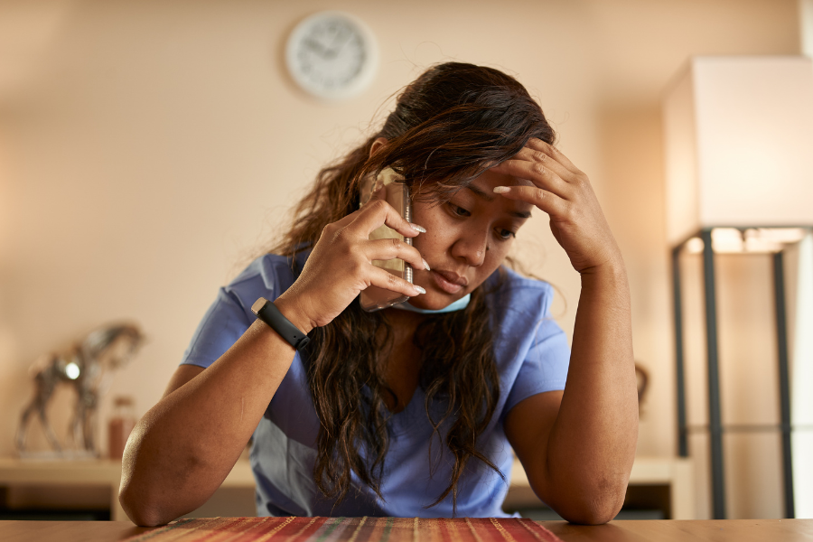 Woman frustrated on mobile phone